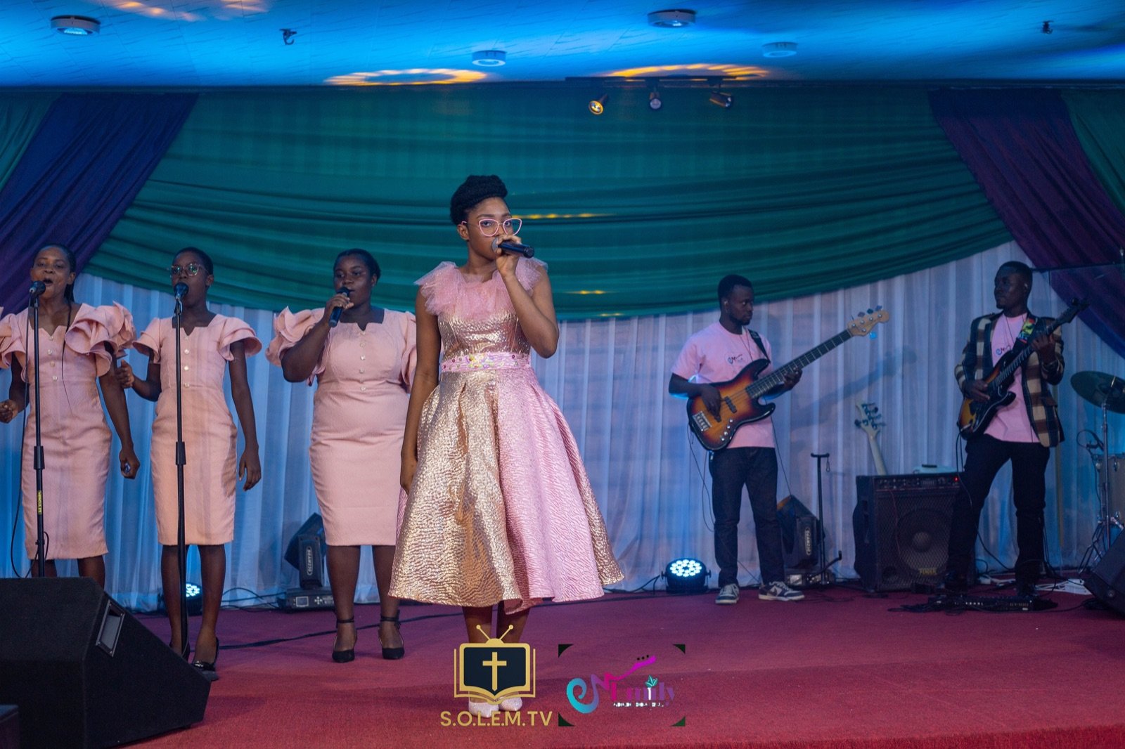 Emily performing with her band